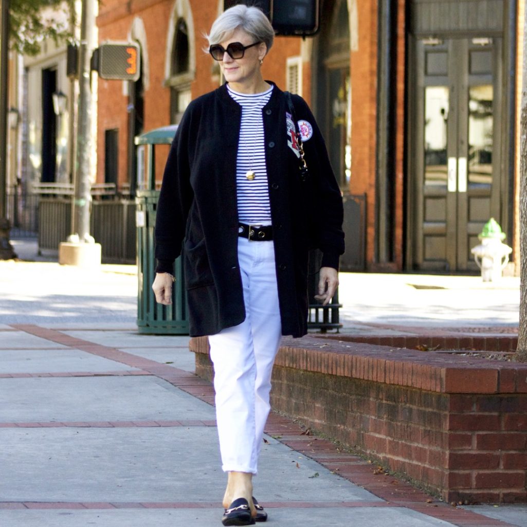 black cardigan, white denim, black mules