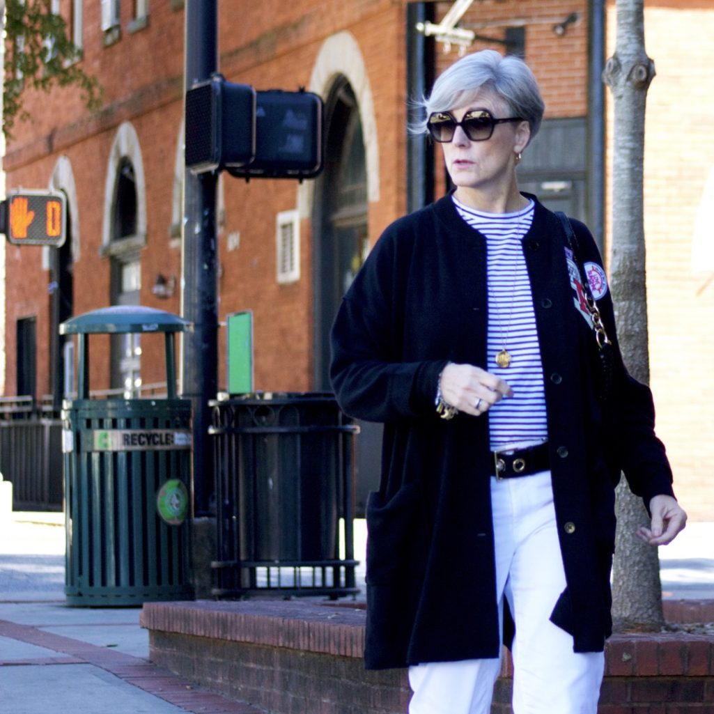 black cardigan, white denim, black mules
