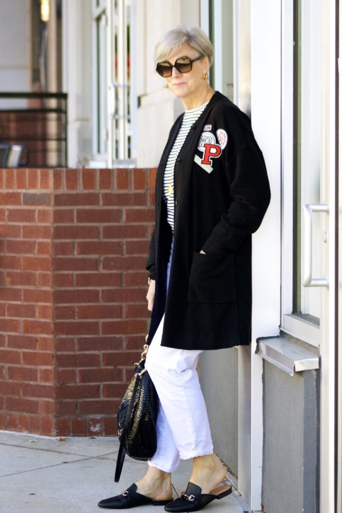 black cardigan, white denim, black mules