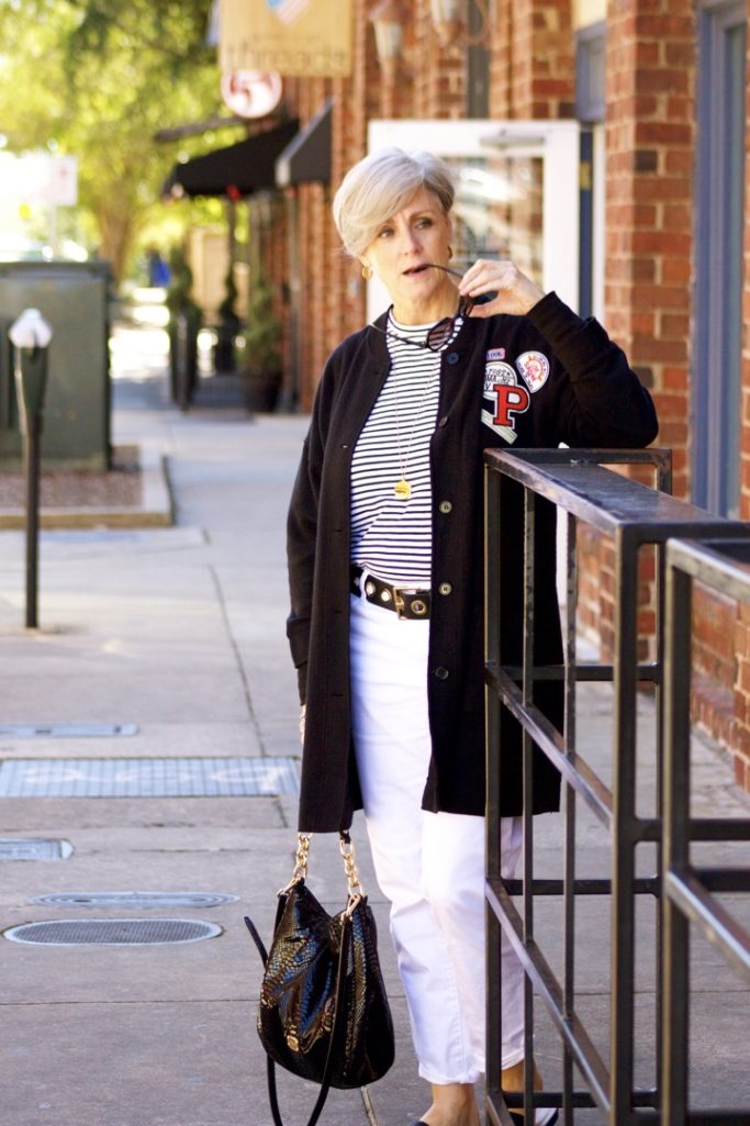 black cardigan, white denim, black mules
