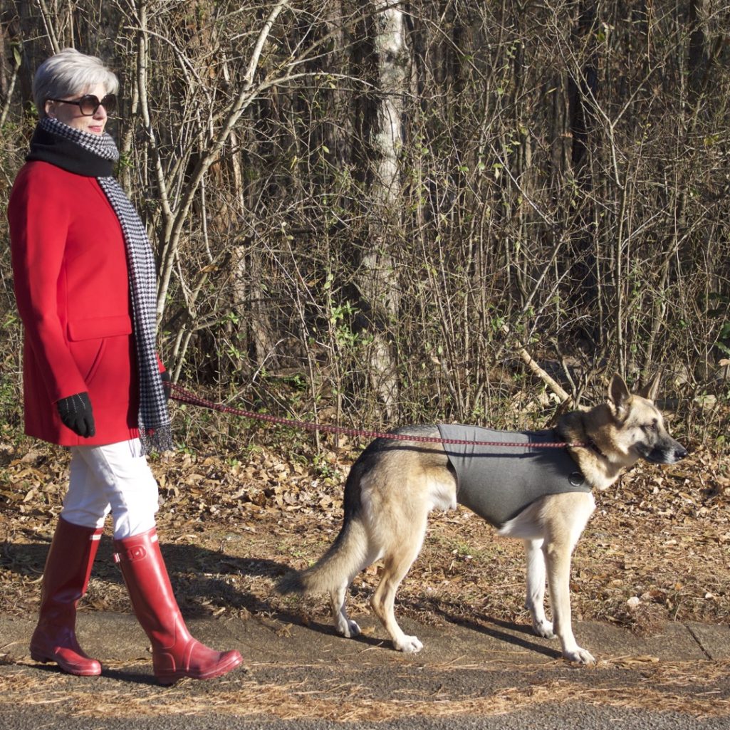 red stadium coat, striped crewneck, white denim, red hunter boots, houndstooth cashmere scarf