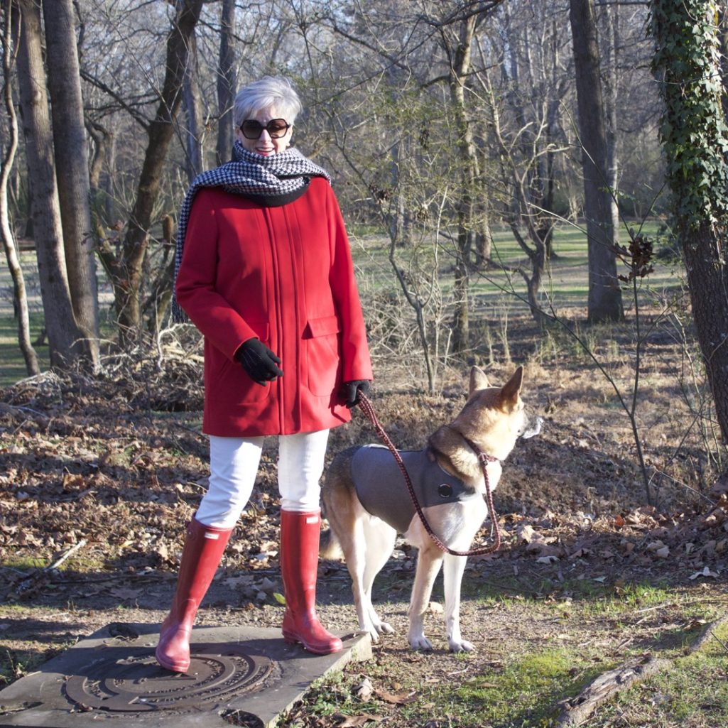 red stadium coat, striped crewneck, white denim, red hunter boots, houndstooth cashmere scarf