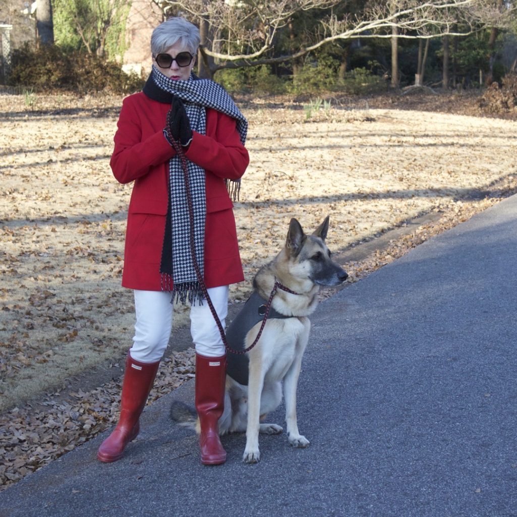 red stadium coat, striped crewneck, white denim, red hunter boots, houndstooth cashmere scarf
