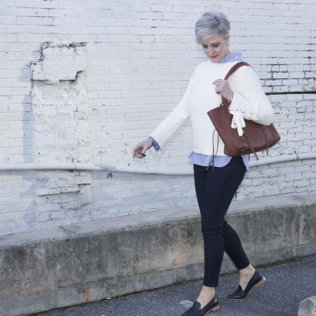 ann taylor grommet sweater, striped ruffled shirt, denim, everlane loafers