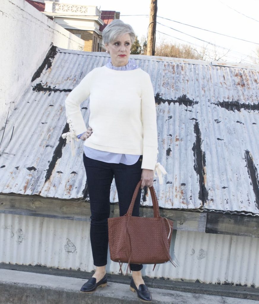 ann taylor grommet sweater, striped ruffled shirt, denim, everlane loafers