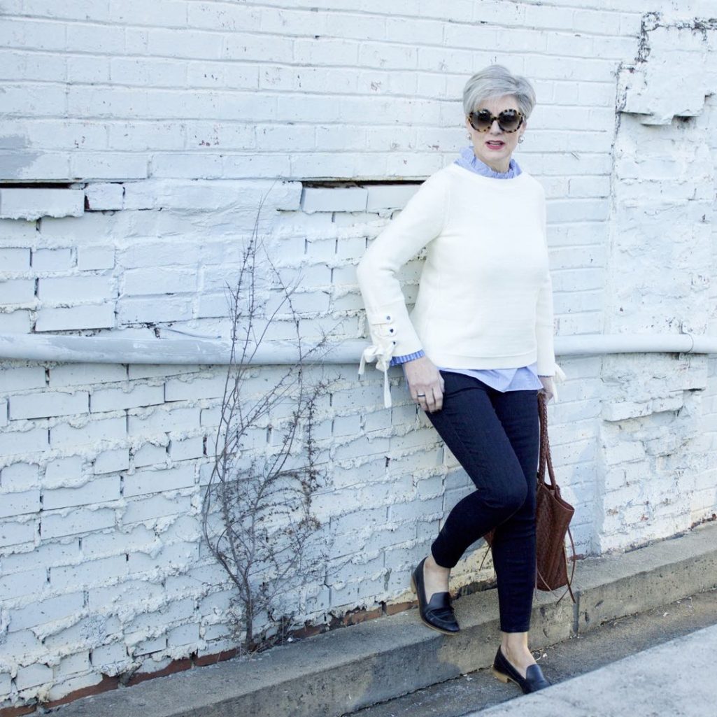 ann taylor grommet sweater, striped ruffled shirt, denim, everlane loafers