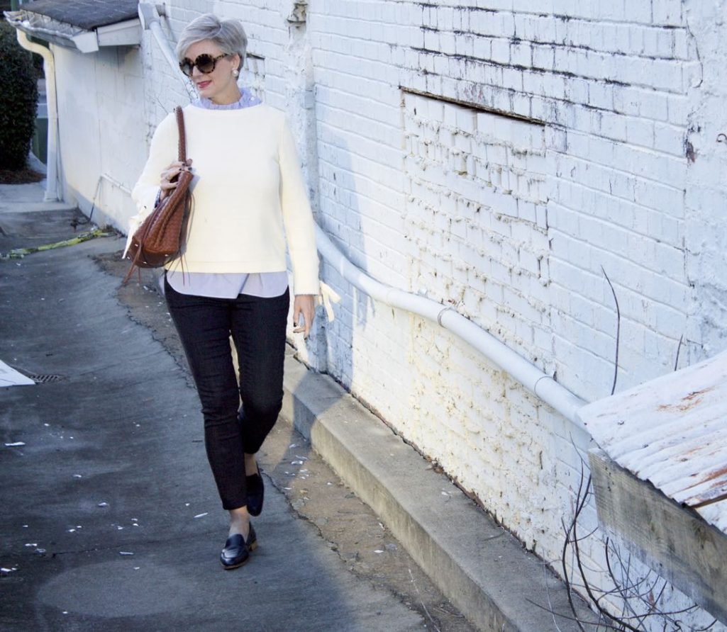 ann taylor grommet sweater, striped ruffled shirt, denim, everlane loafers