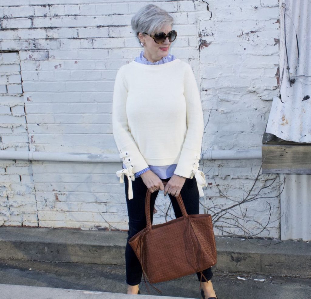 ann taylor grommet sweater, striped ruffled shirt, denim, everlane loafers