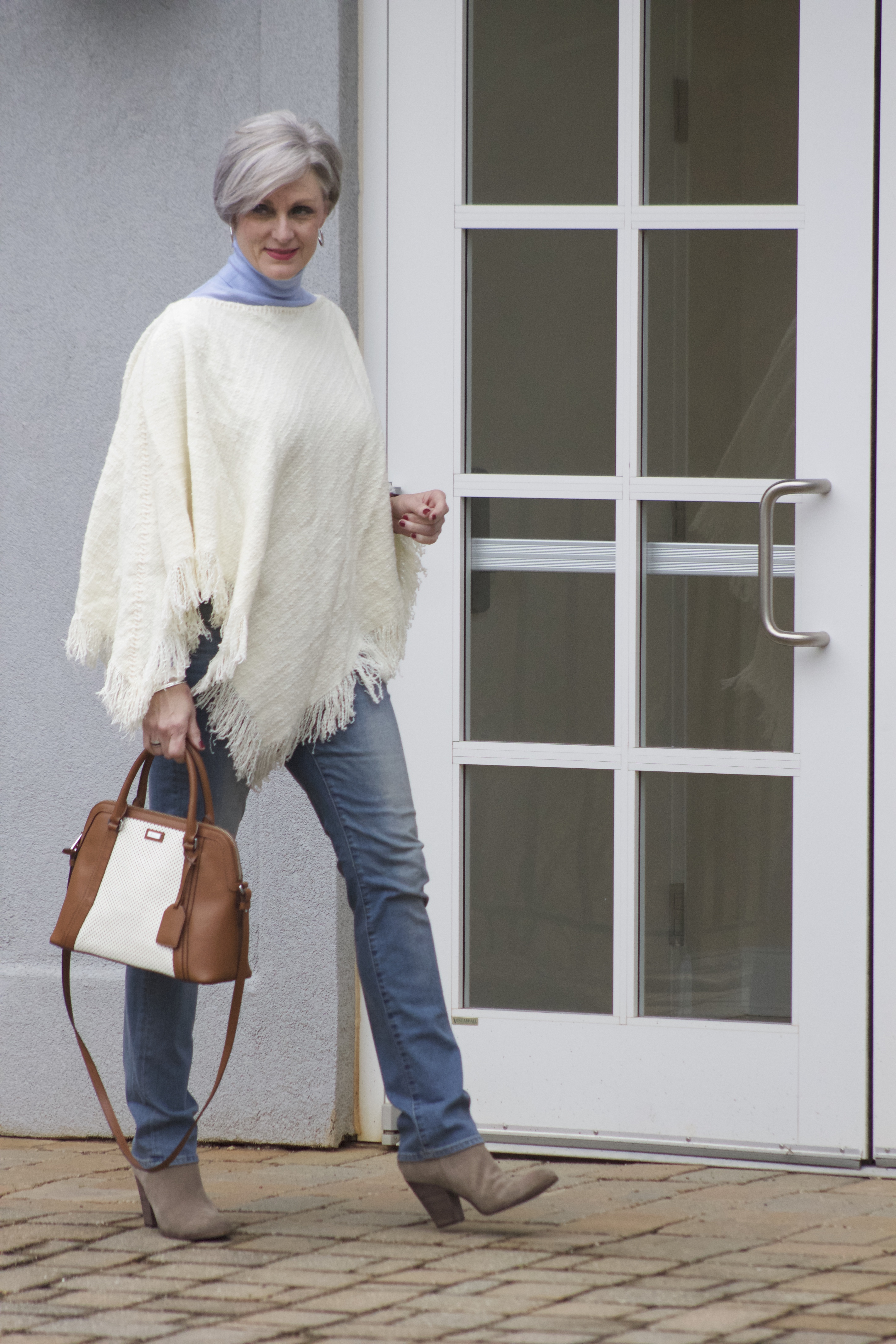 put a poncho on