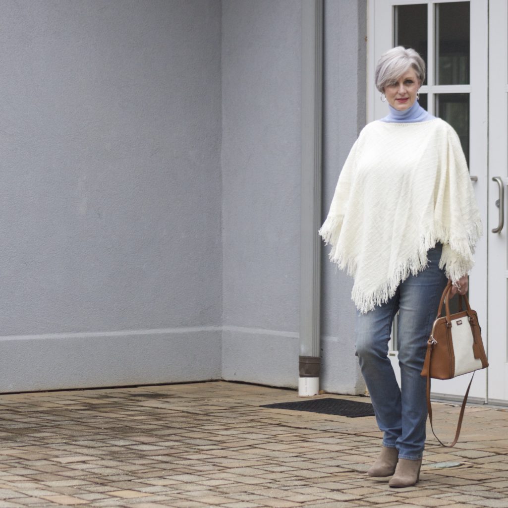 put a poncho on