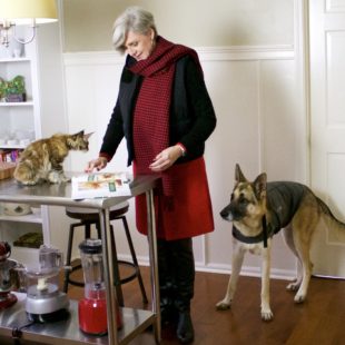 talbots red skirt, talbots cashmere crewneck, ralph lauren puffer vest, over the knee boots