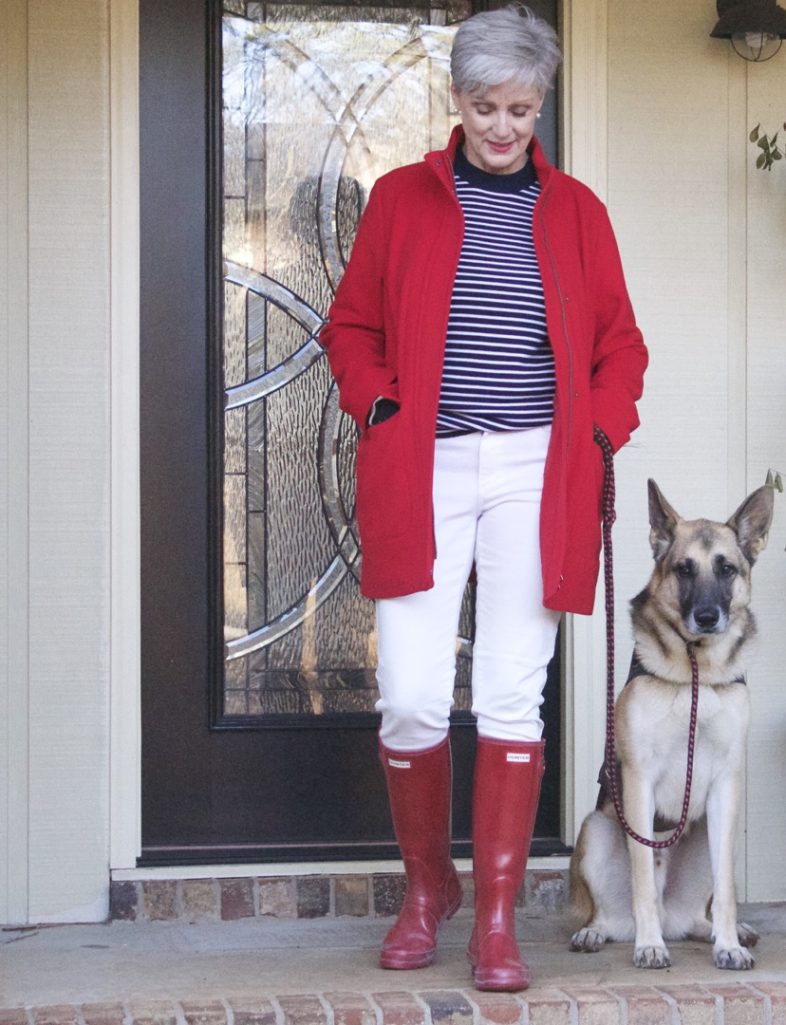red stadium coat, striped crewneck, white denim, red hunter boots, houndstooth cashmere scarf