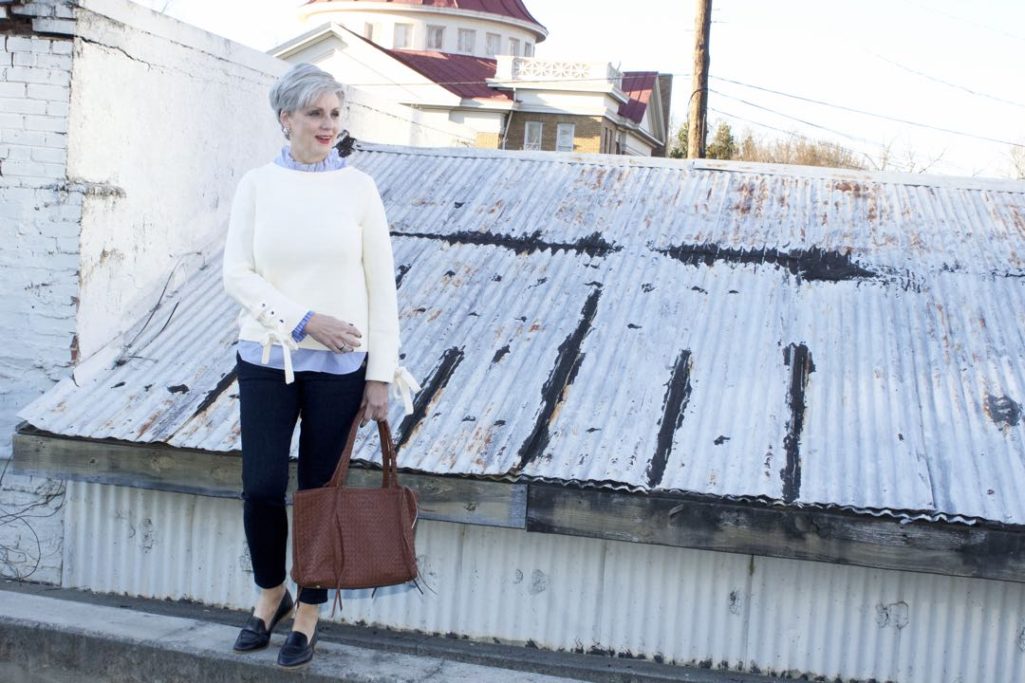 ann taylor grommet sweater, striped ruffled shirt, denim, everlane loafers