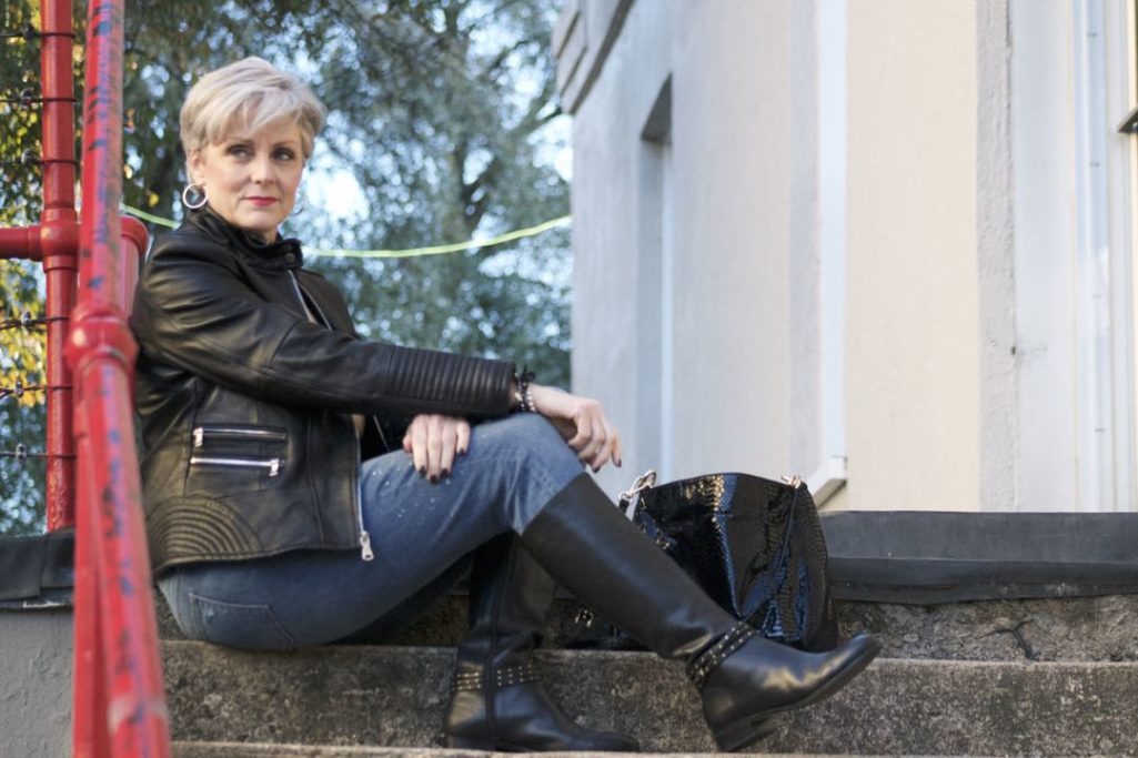 vince camuto leather moto jacket, everlane cashmere sweater, j.crew skinny toothpick, talbots riding boots, michael kors handbag