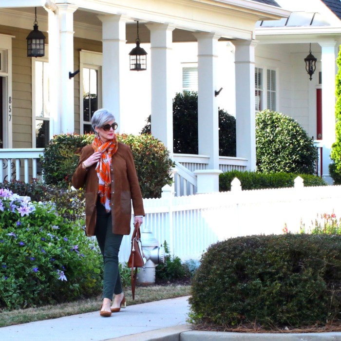 shifting into neutral with suede duster, white shirt, and green cargo pants
