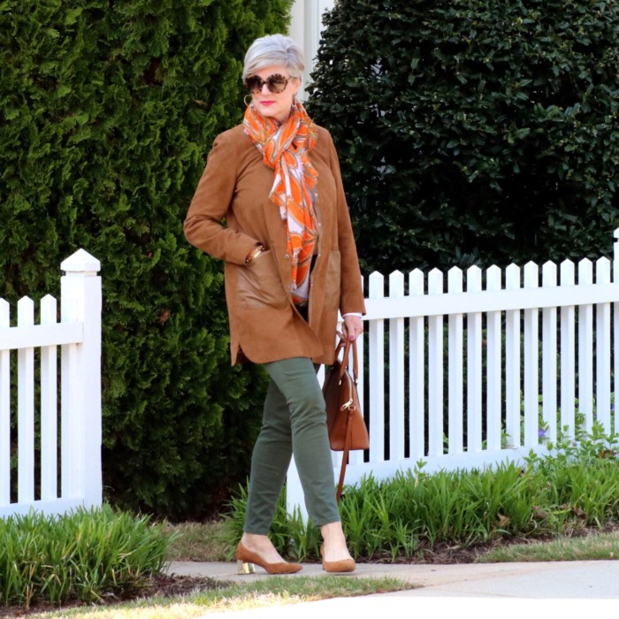 shifting into neutral with suede duster, white shirt, and green cargo pants