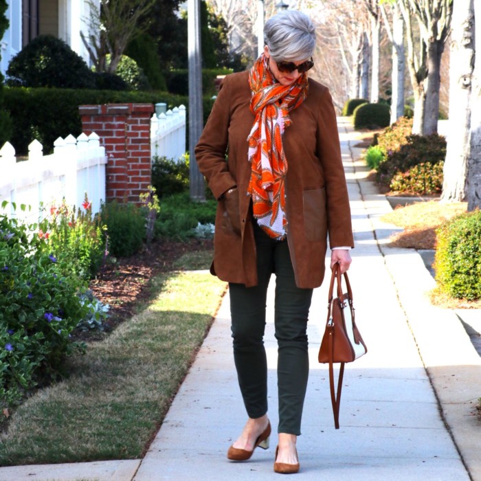 shifting into neutral with suede duster, white shirt, and green cargo pants