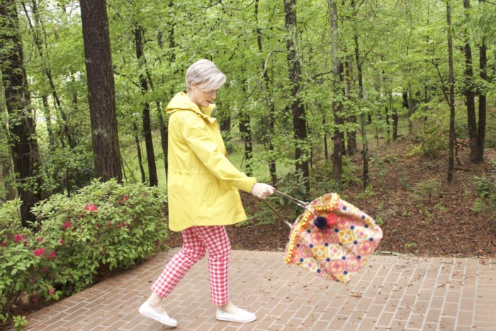 marks and spencer yellow slicker, boden gingham pants, boden cashmere sweater, sperry sneakers, trina turk tote, over 50 fashion blogger