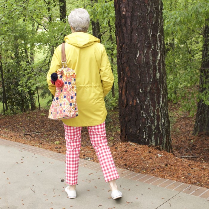 marks and spencer yellow slicker, boden gingham pants, boden cashmere sweater, sperry sneakers, trina turk tote, over 50 fashion blogger