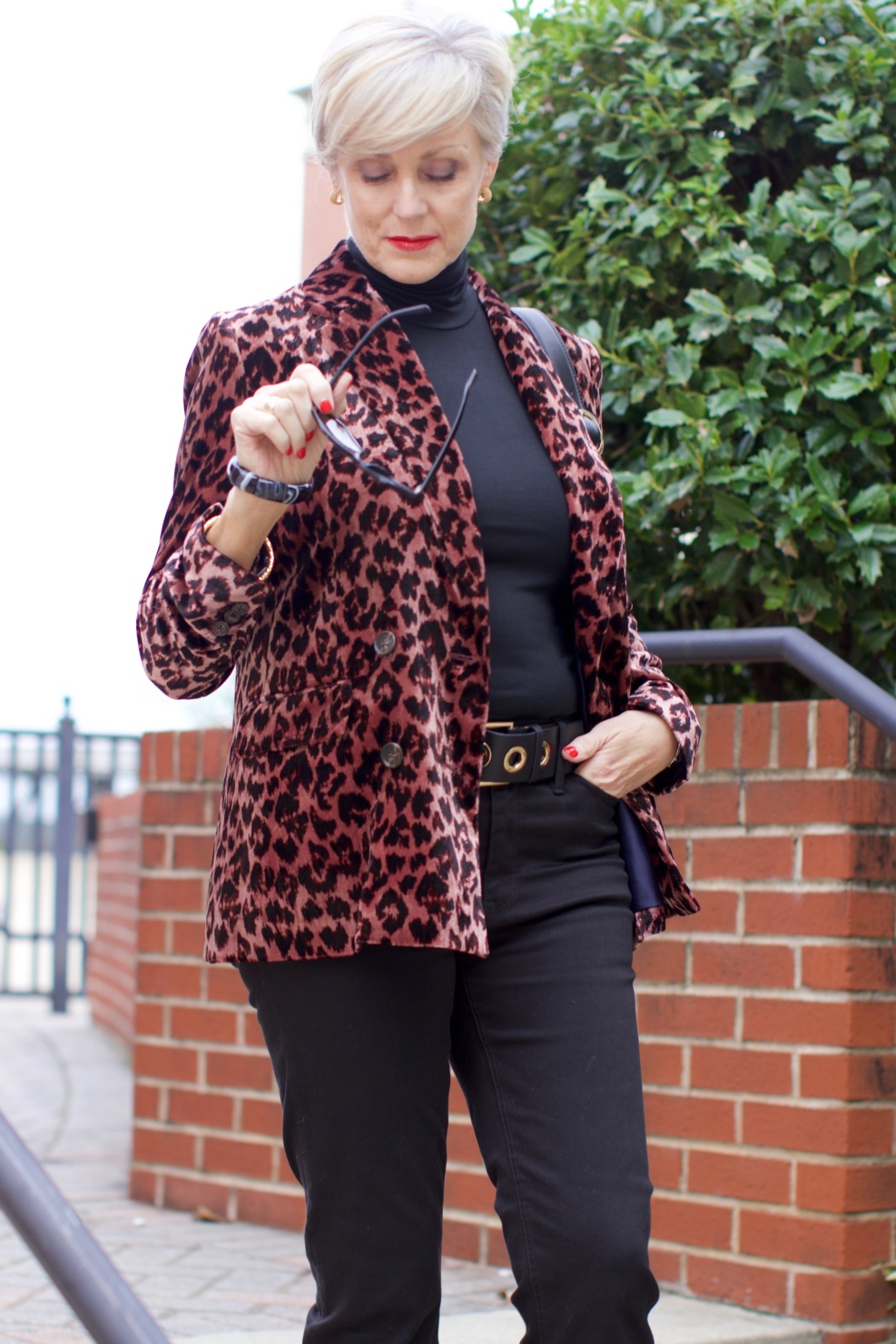beth at Style at a Certain Age wears a J.Crew leopard blazer, cropped black jeans, Ralph Lauren turtleneck and Gucci dupes