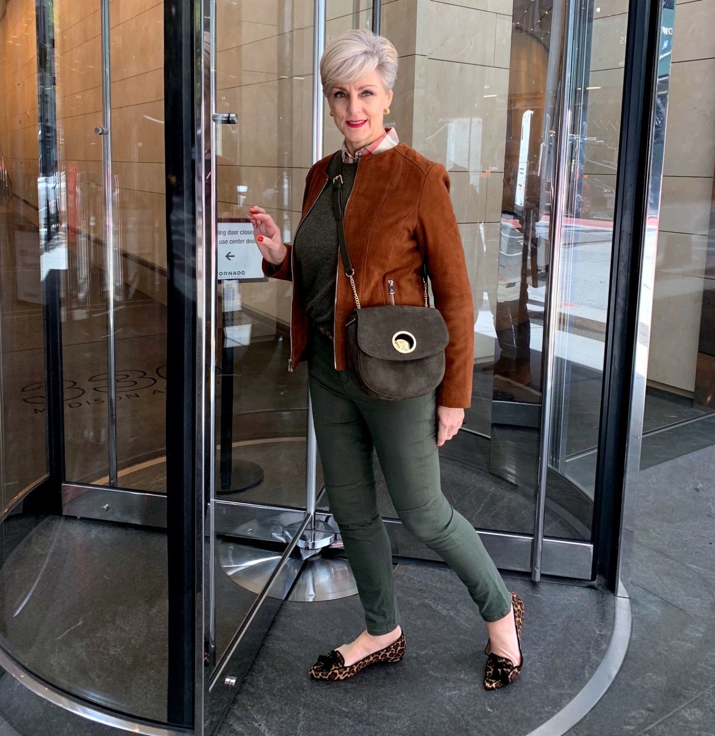 brown suede jacket, green cashmere sweater, leopard flats