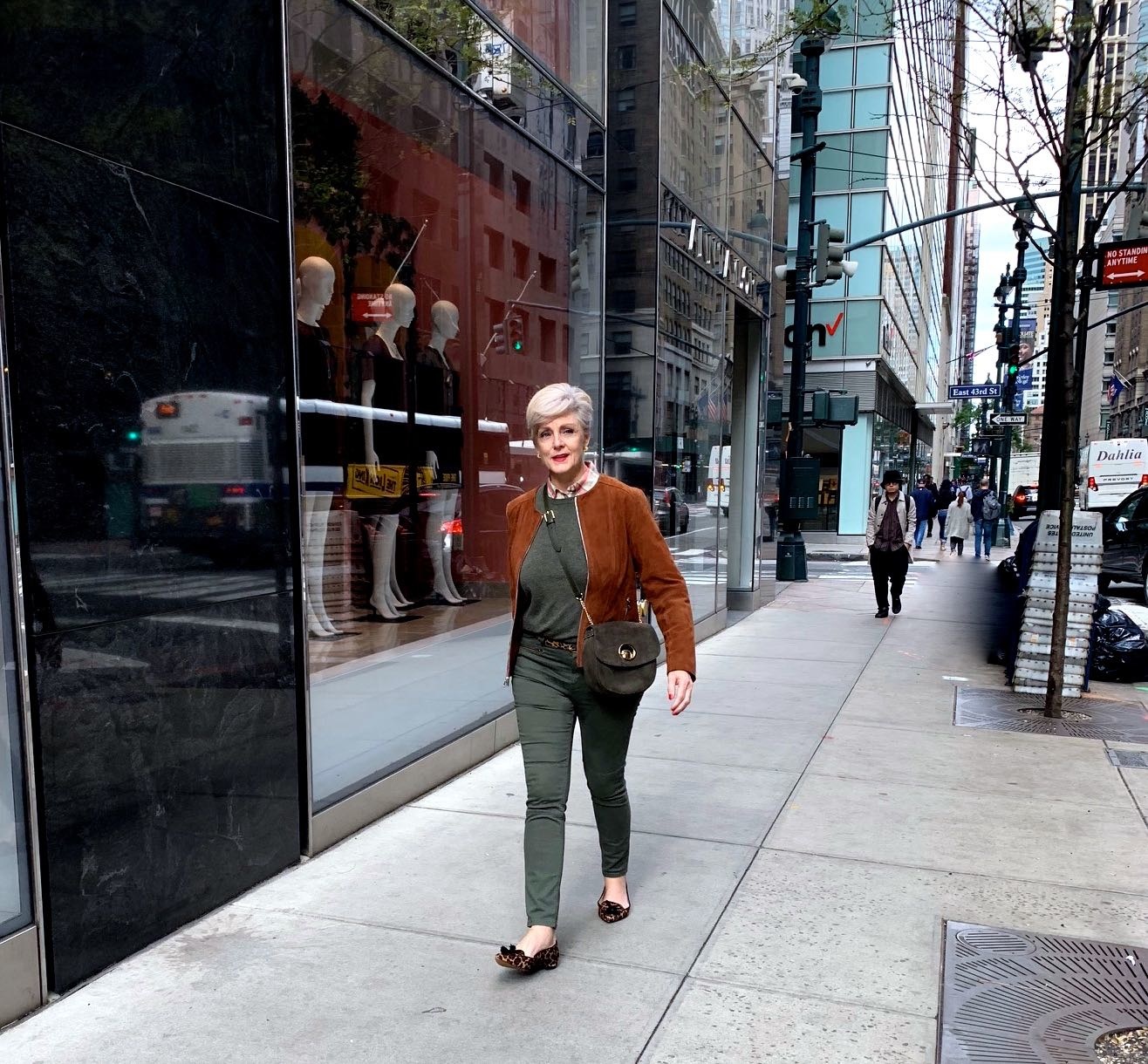 brown suede jacket, green cashmere sweater, leopard flats