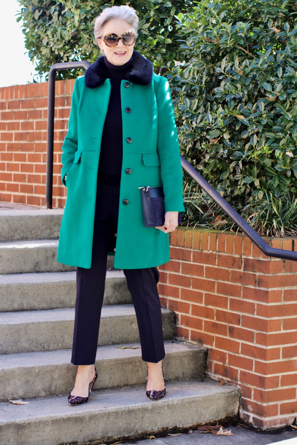 beth from Style at a Certain Age wears an Everlane cashmere turtleneck, Italian weave ankle pants, leopard pumps, and Talbots green overcoat