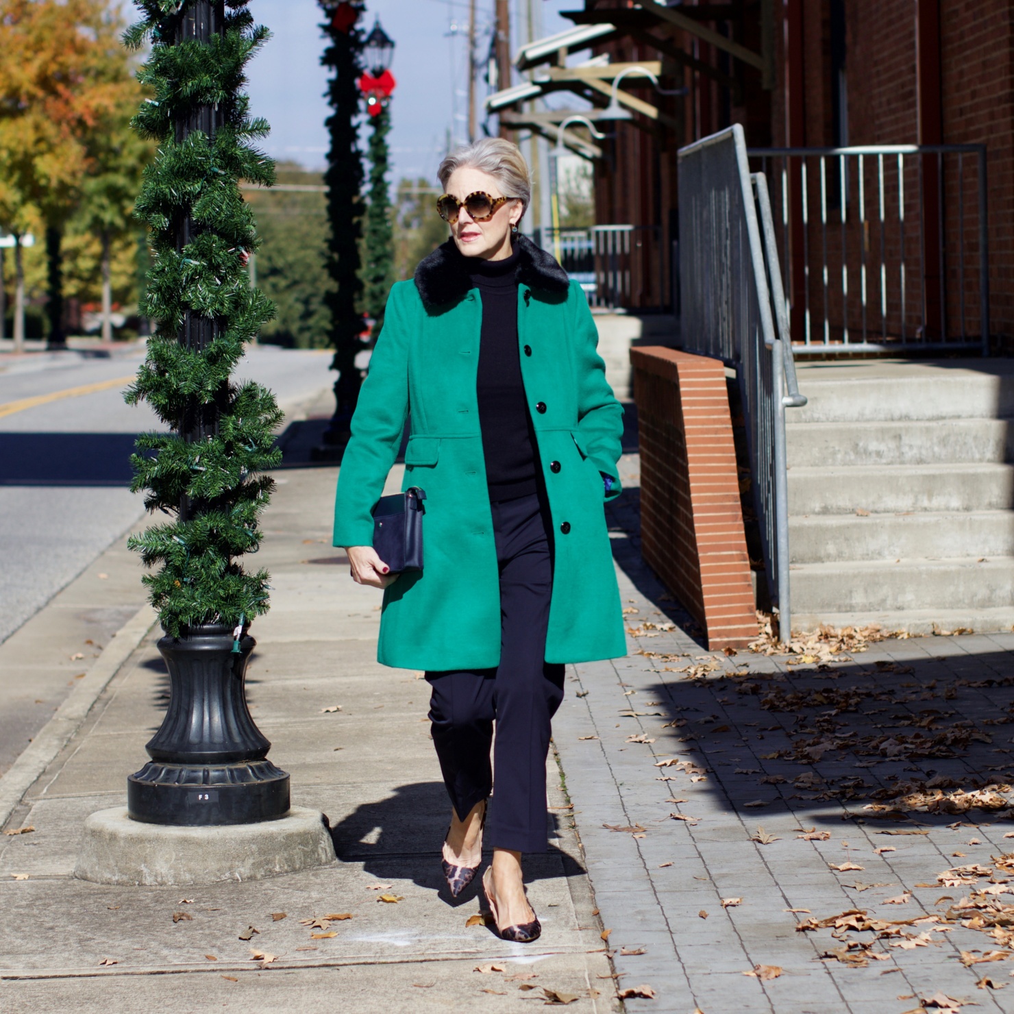 beth from Style at a Certain Age wears an Everlane cashmere turtleneck, Italian weave ankle pants, leopard pumps, and Talbots green overcoat