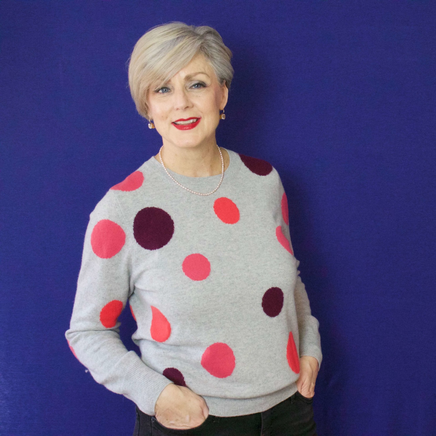 beth from Style at a Certain Age wears a polka dot cashmere sweater from Marks & Spencer