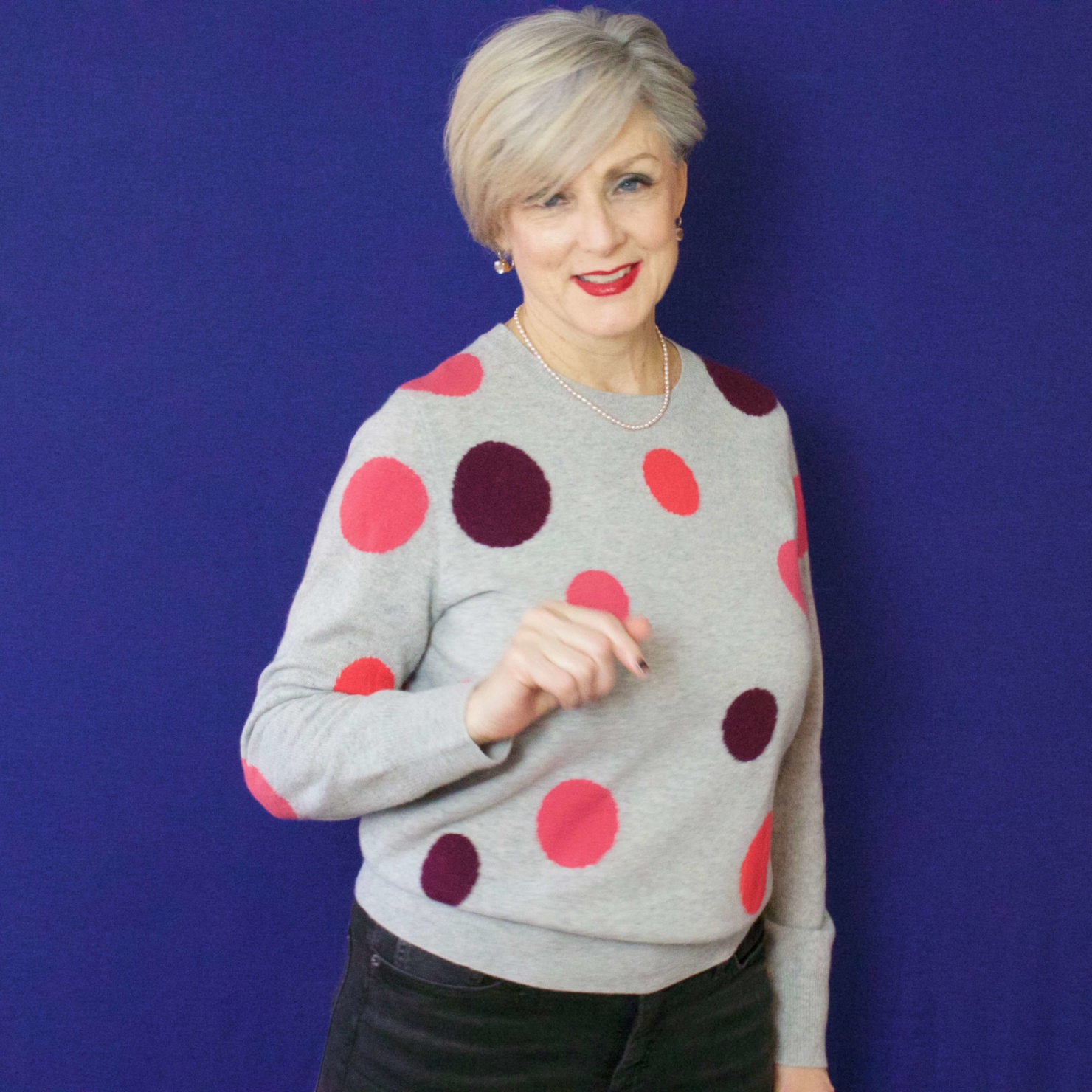 beth from Style at a Certain Age wears a polka dot cashmere sweater from Marks & Spencer