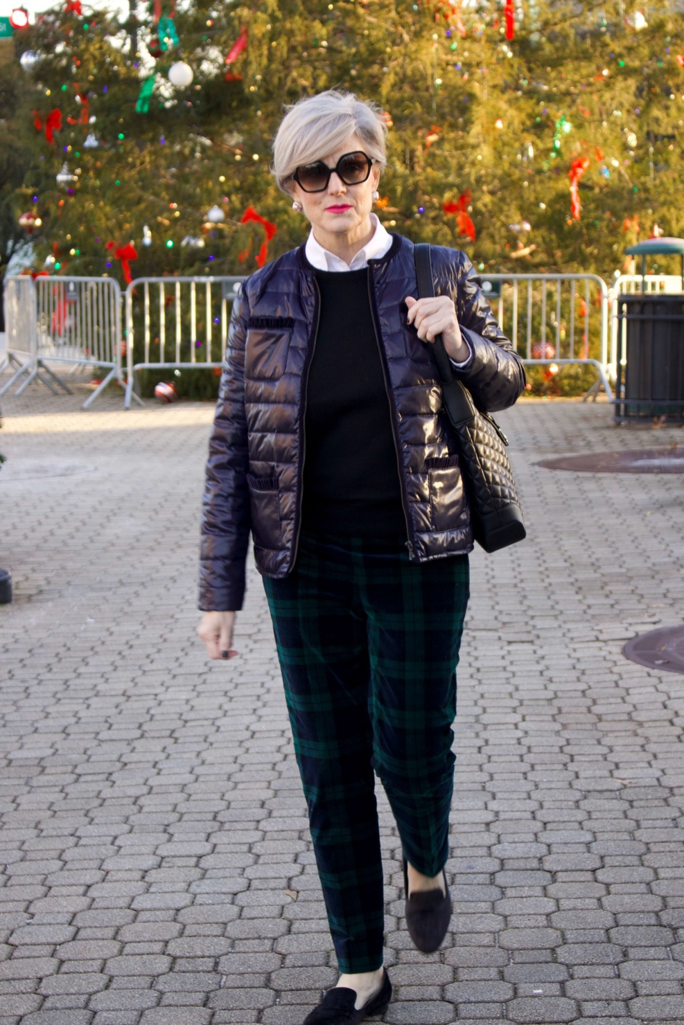 Christmas in the City - beth from Style at a Certain Age wears Talbots black watch plaid ankle pants, Everland black cashmere crewneck, Talbots navy puffer jacket