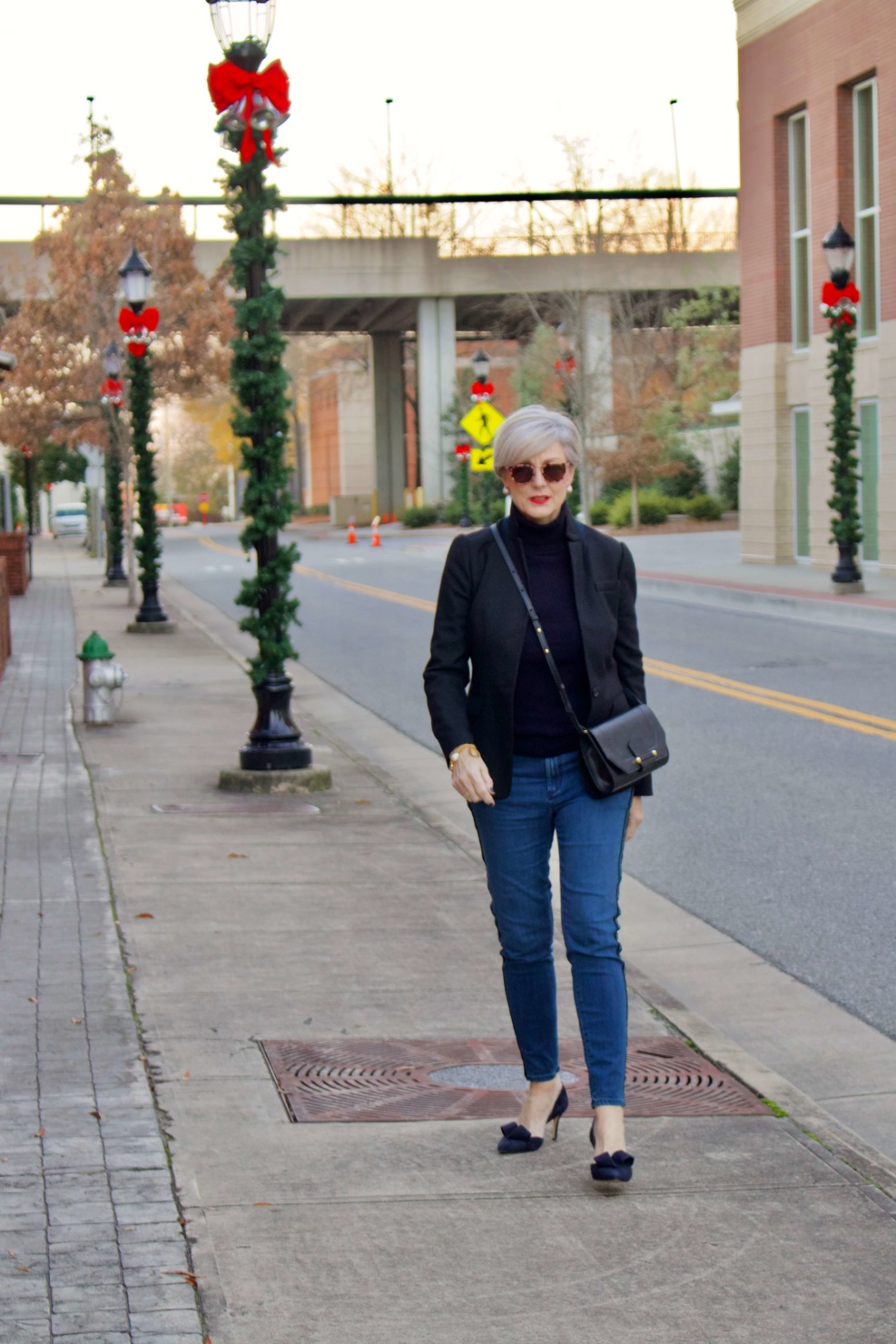 beth from style at a certain age wears tuxedo denim from Ann Taylor, cashmere turtleneck from Everlane and Parker blazer from J.Crew