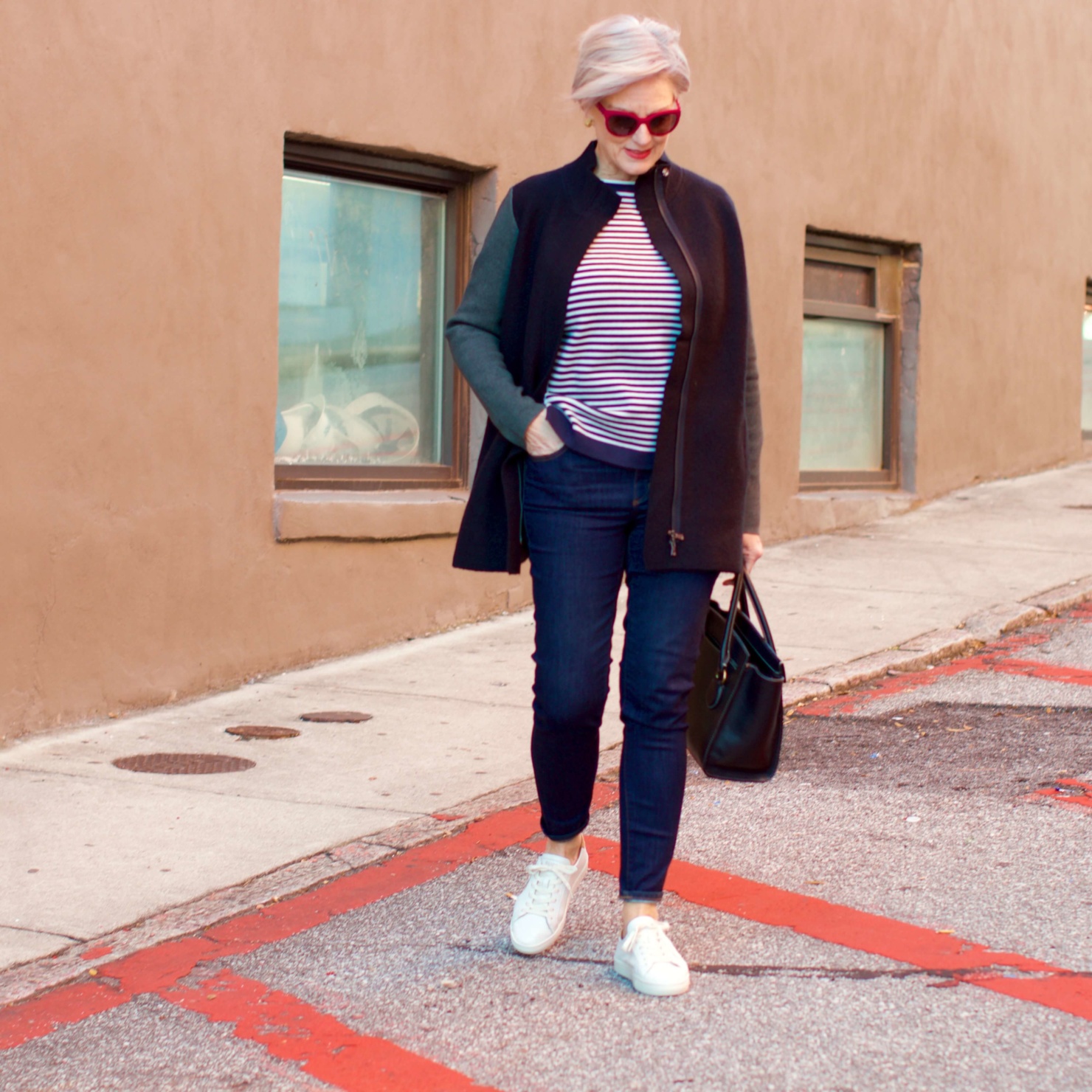 beth from Style at a Certain Age wears an Ann Taylor blue tweed jacket, faux denim sailor pants, v neck button sleeve blouse, silk ribbon chain scarf, and pointy toe booties
