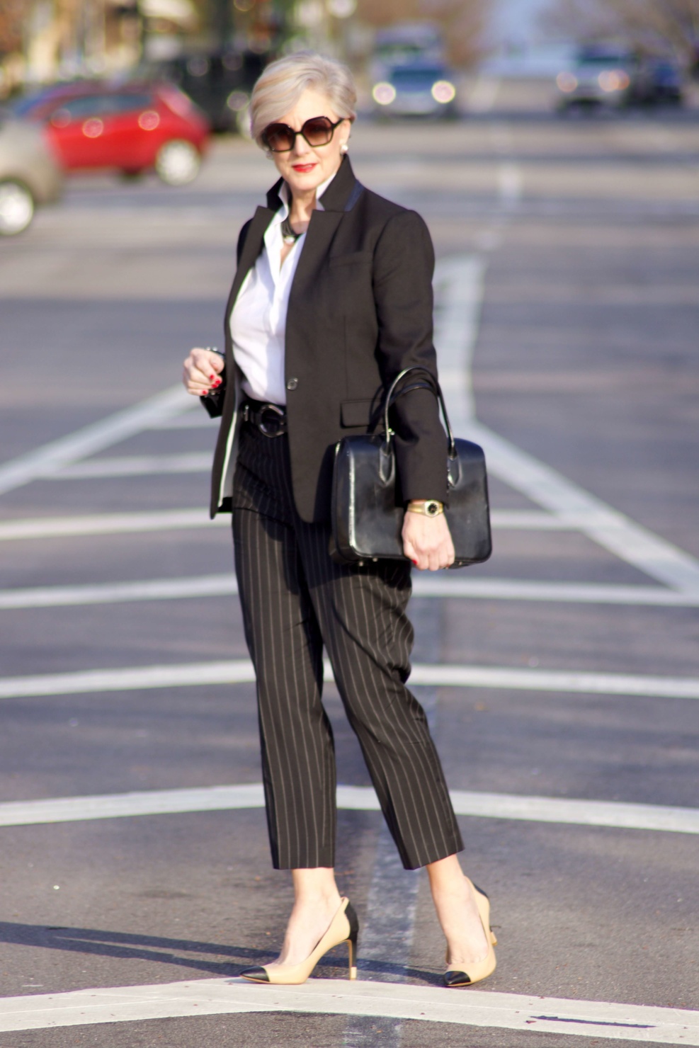 beth from Style at a Certain Age wears Ralph Lauren pinstripe pants, Misook white blouse, J.Crew black blazer, cap toe pumps and black handbag