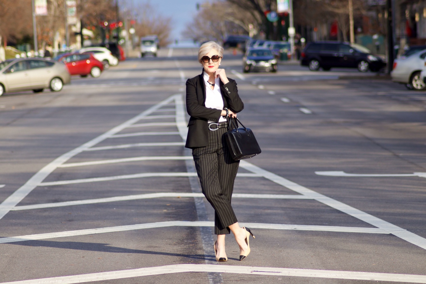 beth from Style at a Certain Age wears Ralph Lauren pinstripe pants, Misook white blouse, J.Crew black blazer, cap toe pumps and black handbag