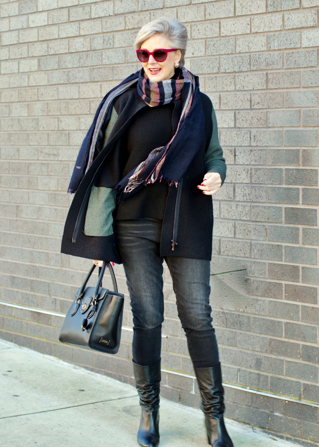 beth from Style at a Certain Age wears an Everlane cashmere waffle square turtleneck, J.Crew Factory black high rise skinny jean, Ann Taylor coatigan, Via Spiga black slouchy boots, Ralph Lauren black handbag, and wool scarf