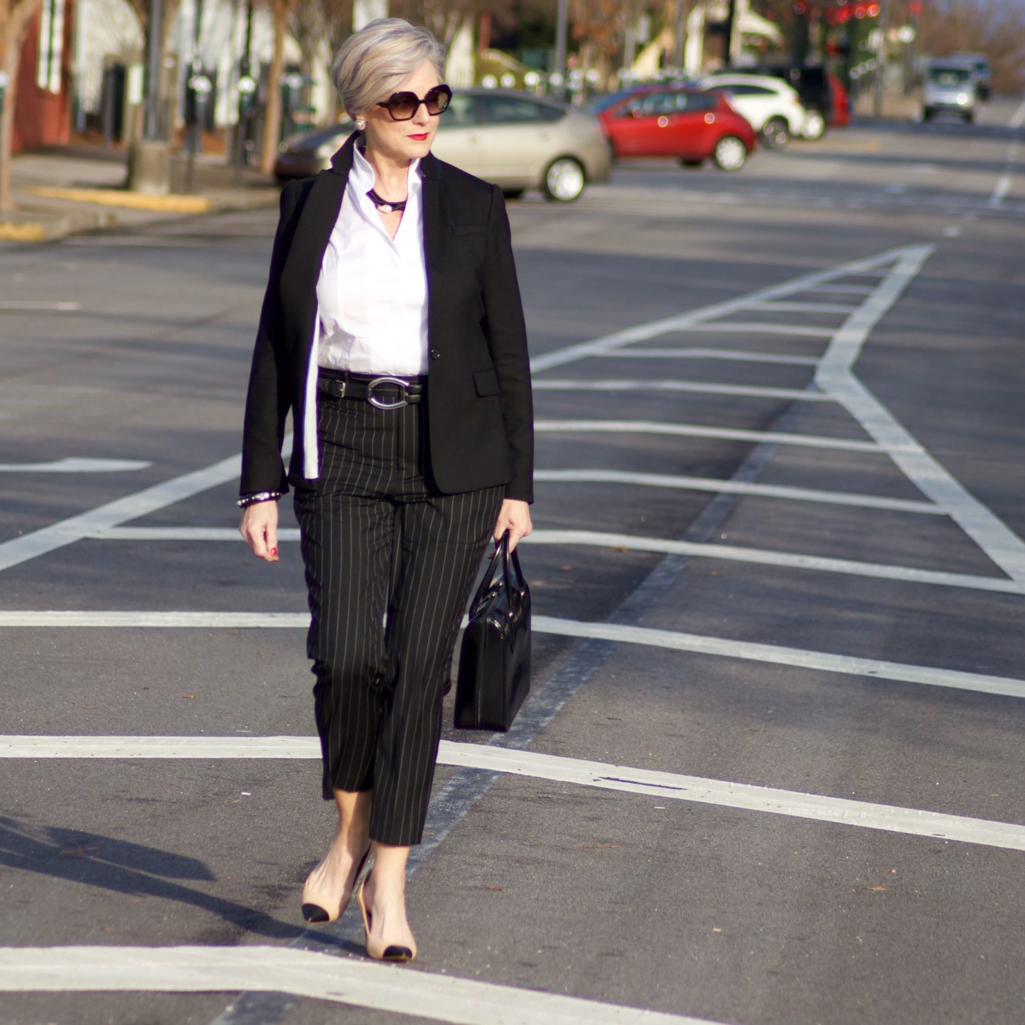 beth from Style at a Certain Age wears Ralph Lauren pinstripe pants, Misook white blouse, J.Crew black blazer, cap toe pumps and black handbag