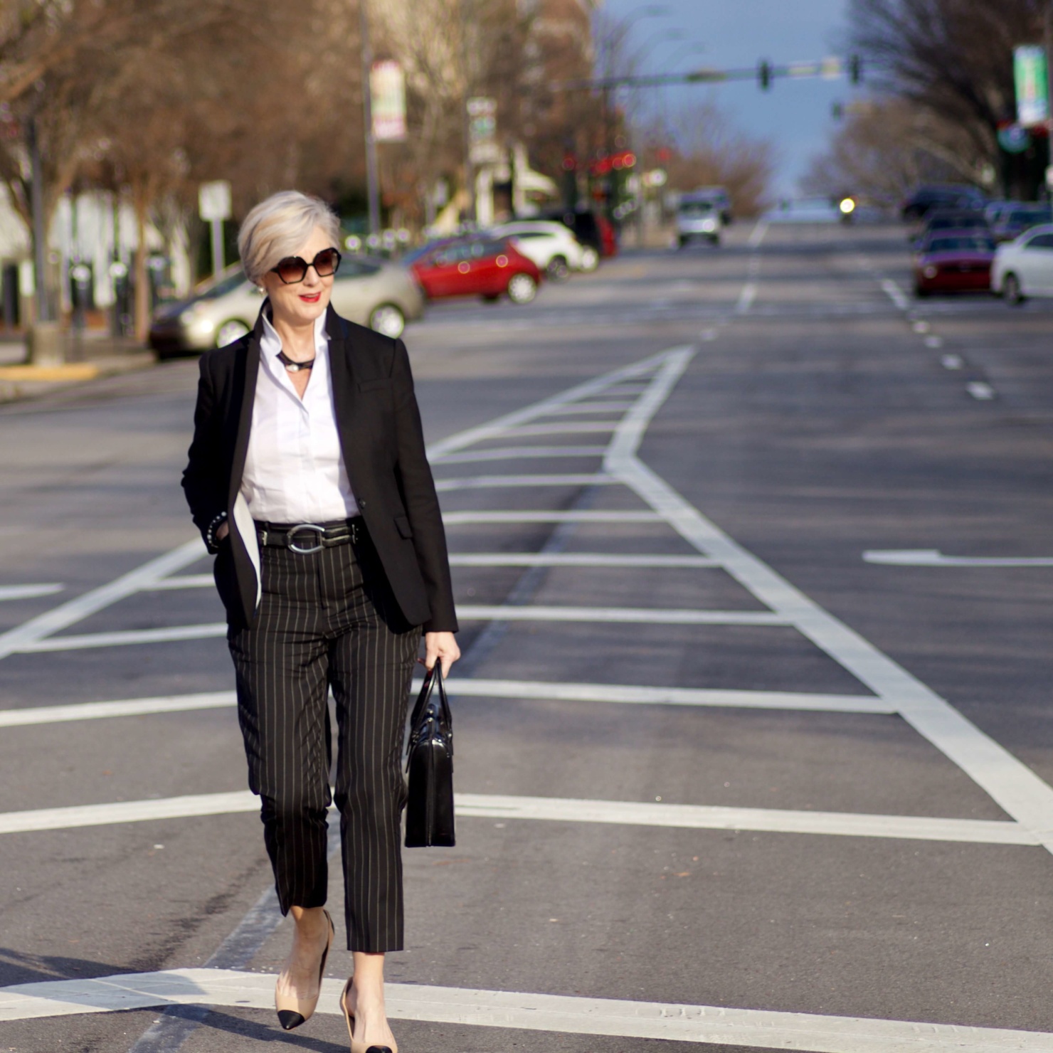 beth from Style at a Certain Age wears Ralph Lauren pinstripe pants, Misook white blouse, J.Crew black blazer, cap toe pumps and black handbag