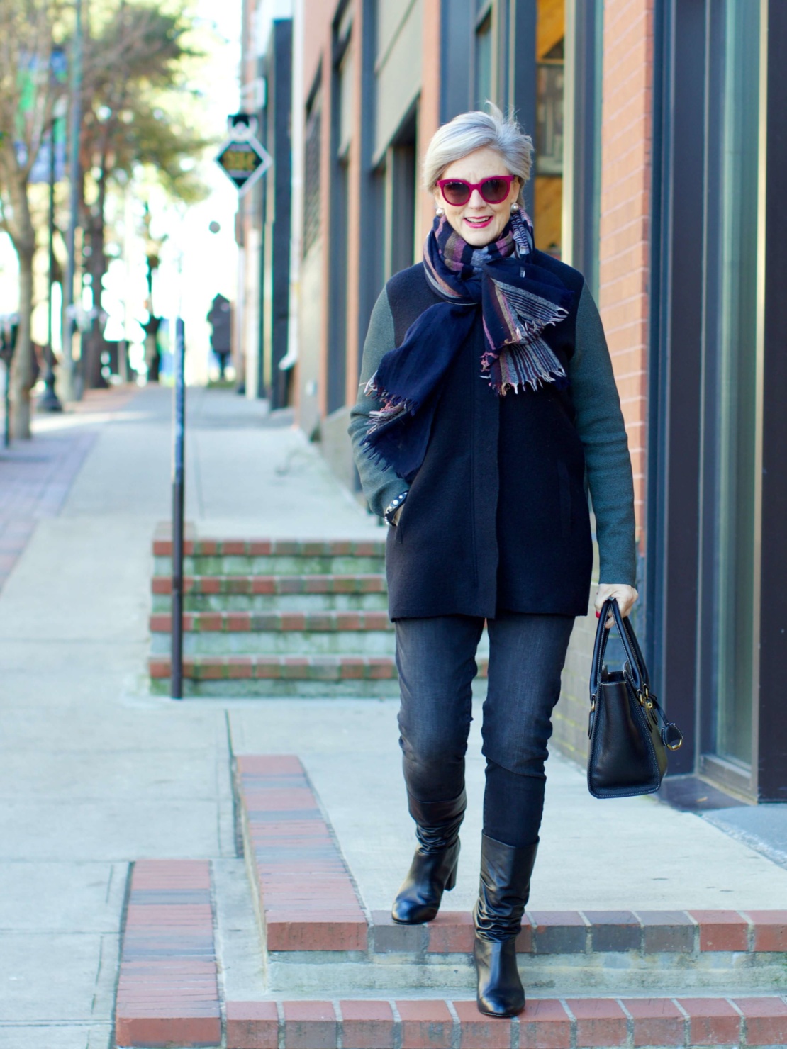 beth from Style at a Certain Age wears an Everlane cashmere waffle square turtleneck, J.Crew Factory black high rise skinny jean, Ann Taylor coatigan, Via Spiga black slouchy boots, Ralph Lauren black handbag, and wool scarf