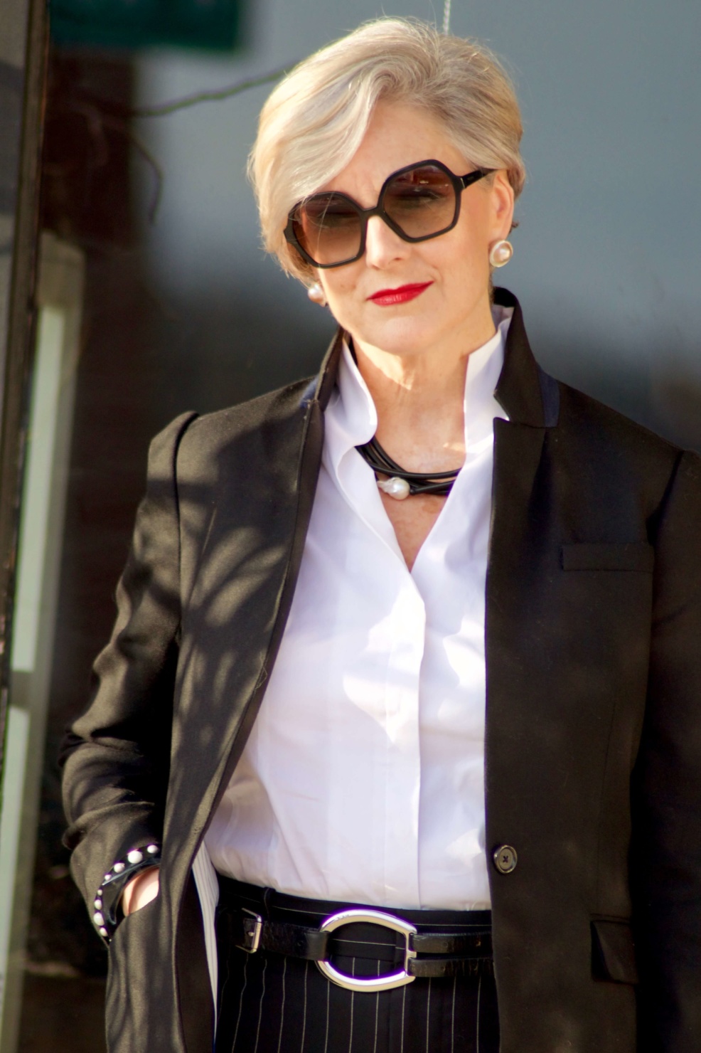 beth from Style at a Certain Age wears Ralph Lauren pinstripe pants, Misook white blouse, J.Crew black blazer, cap toe pumps and black handbag