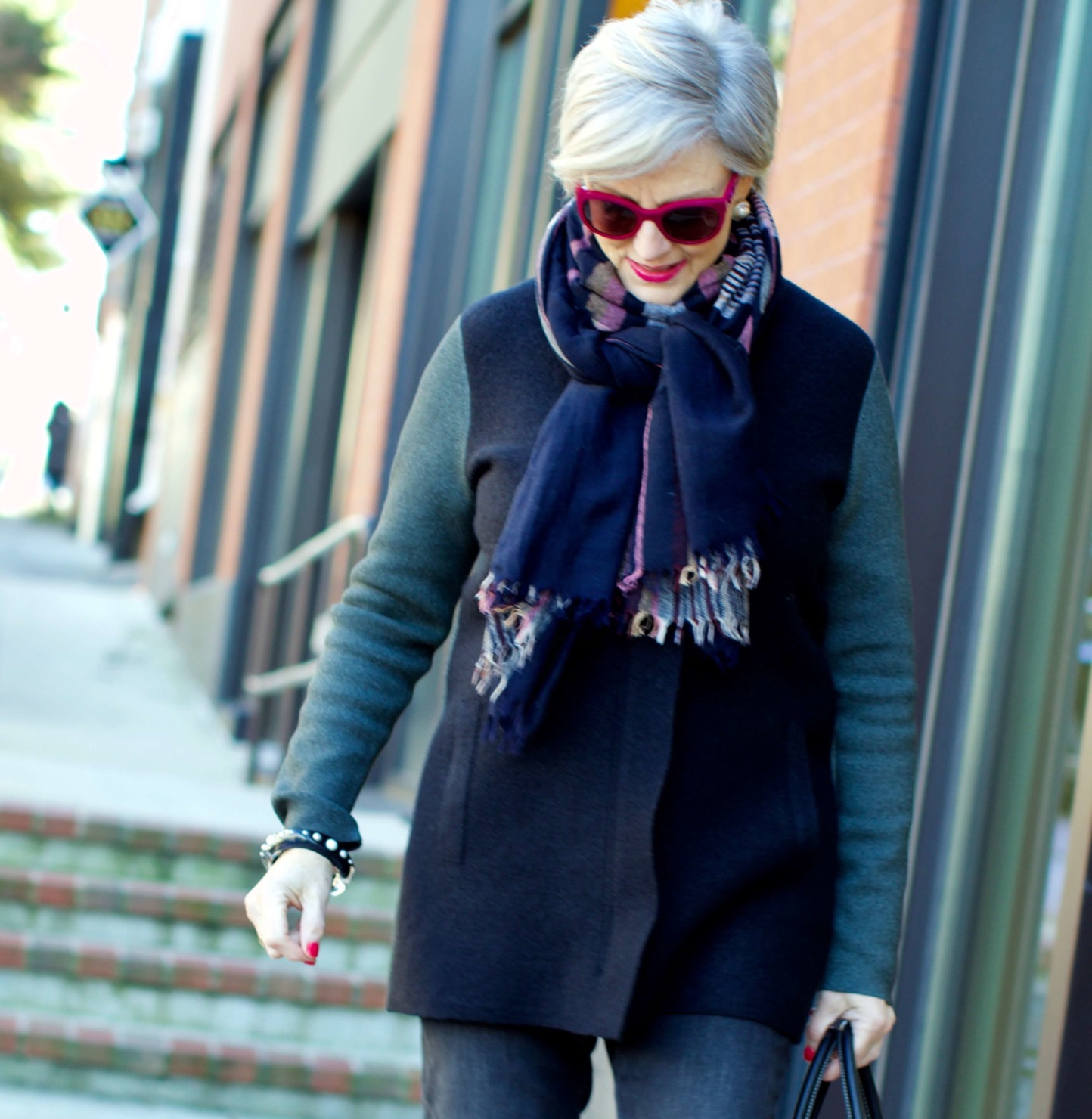beth from Style at a Certain Age wears an Everlane cashmere waffle square turtleneck, J.Crew Factory black high rise skinny jean, Ann Taylor coatigan, Via Spiga black slouchy boots, Ralph Lauren black handbag, and wool scarf