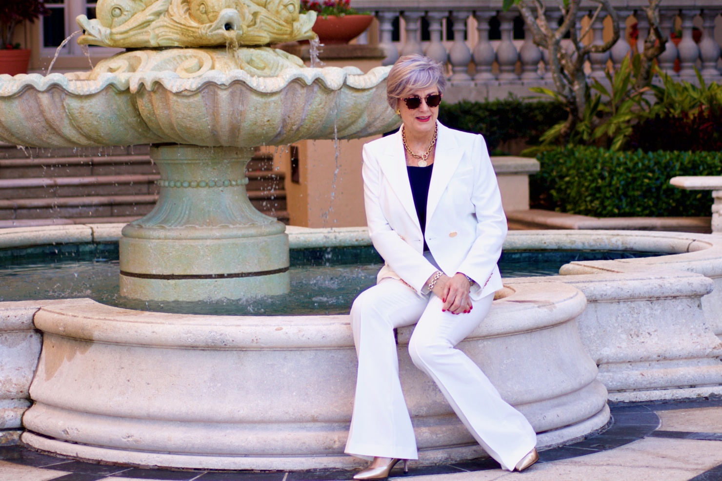 beth from Style at a Certain Age wears a Kobi Halperin ivory structured blazer, ivory trouser pant from Halsbrook