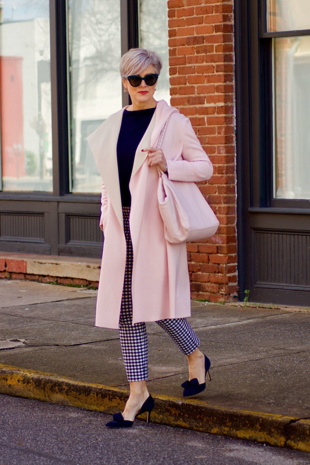 beth from Style at a Certain Age transitions to Spring wearing J.Crew gingham pants, Michael Stars blouson knit top, Misook knit topper and navy suede pumps