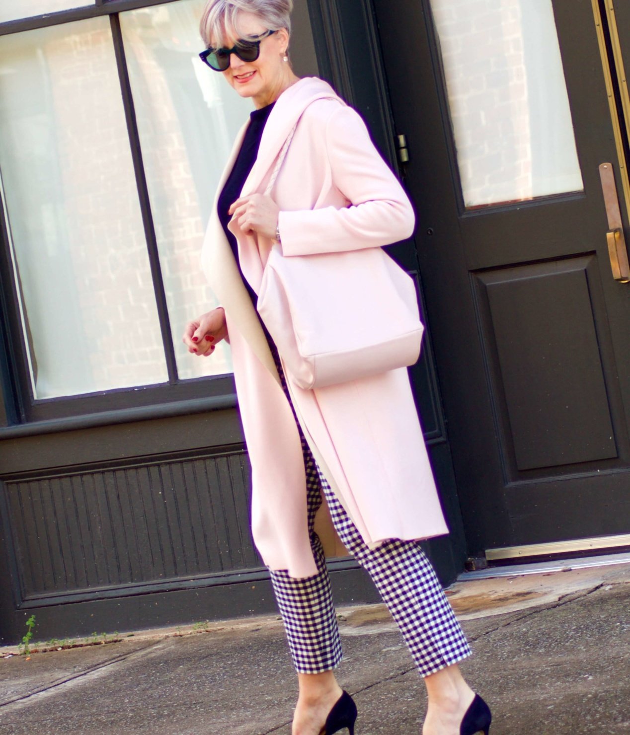 beth from Style at a Certain Age transitions to Spring wearing J.Crew gingham pants, Michael Stars blouson knit top, Misook knit topper and navy suede pumps