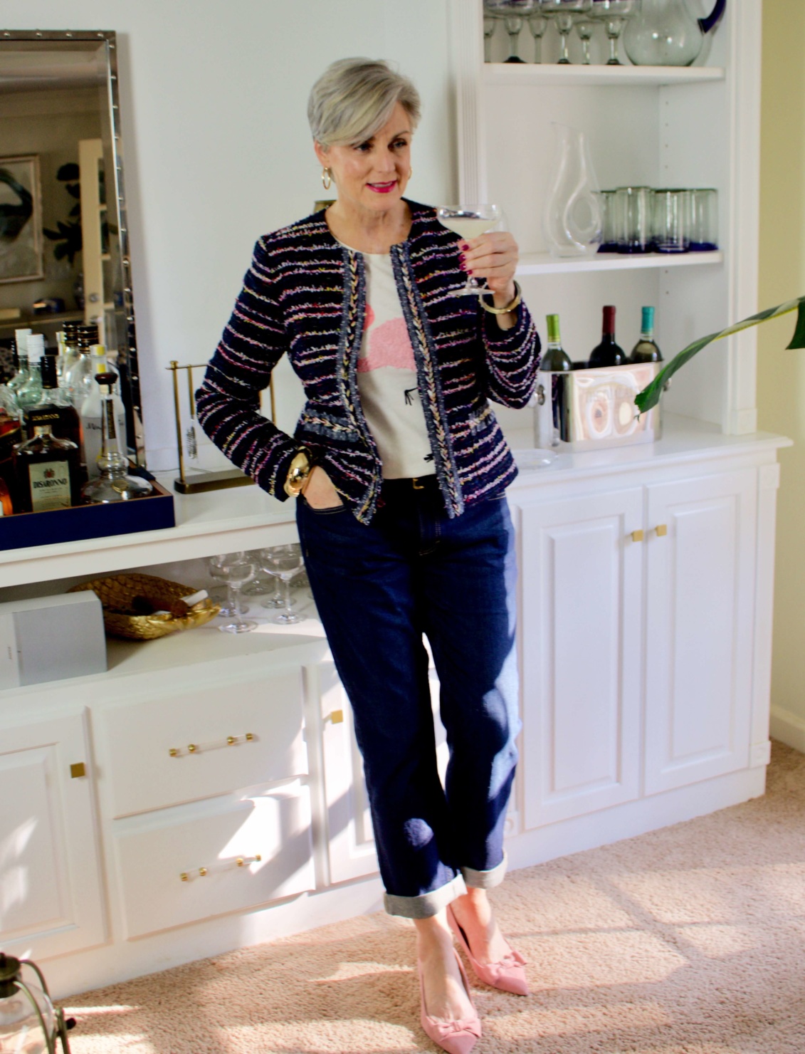 beth from Style at a Certain Age wears boyfriend jeans, graphic tee, tweed blazer and pink kitten heels