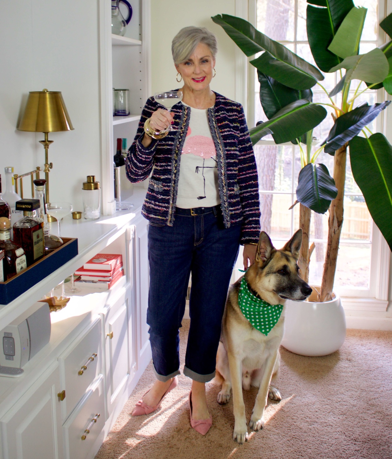 beth from Style at a Certain Age wears boyfriend jeans, graphic tee, tweed blazer and pink kitten heels