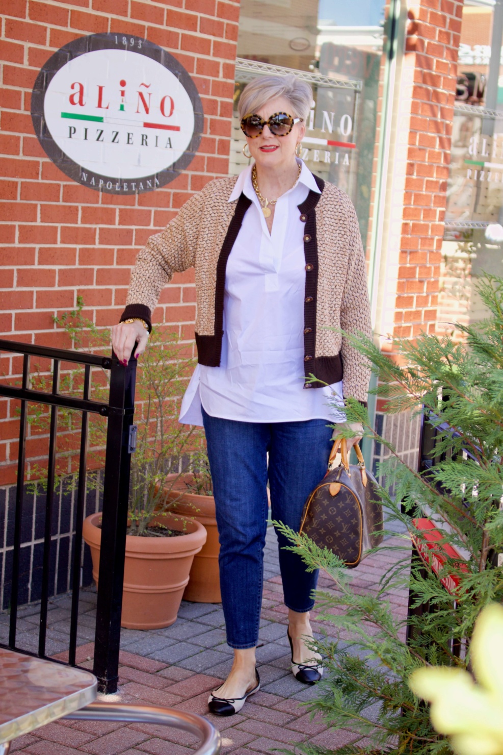 beth from Style at a Certain goes shopping  wearing a Lafayette 148 white shirt, St. John Sport sweater, girlfriend jeans, and ballet flats