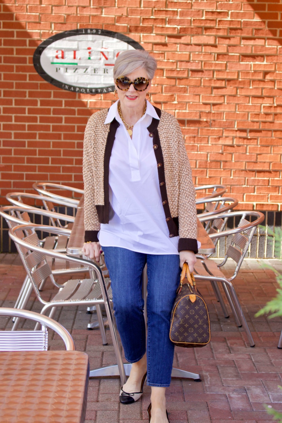 beth from Style at a Certain goes shopping  wearing a Lafayette 148 white shirt, St. John Sport sweater, girlfriend jeans, and ballet flats