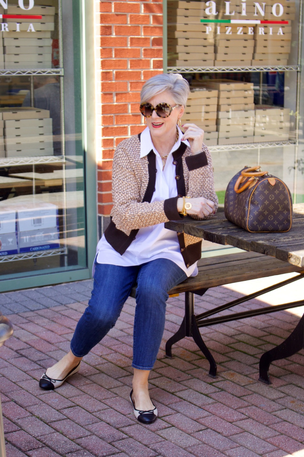 beth from Style at a Certain goes shopping wearing a Lafayette 148 white shirt, St. John Sport sweater, girlfriend jeans, and ballet flats