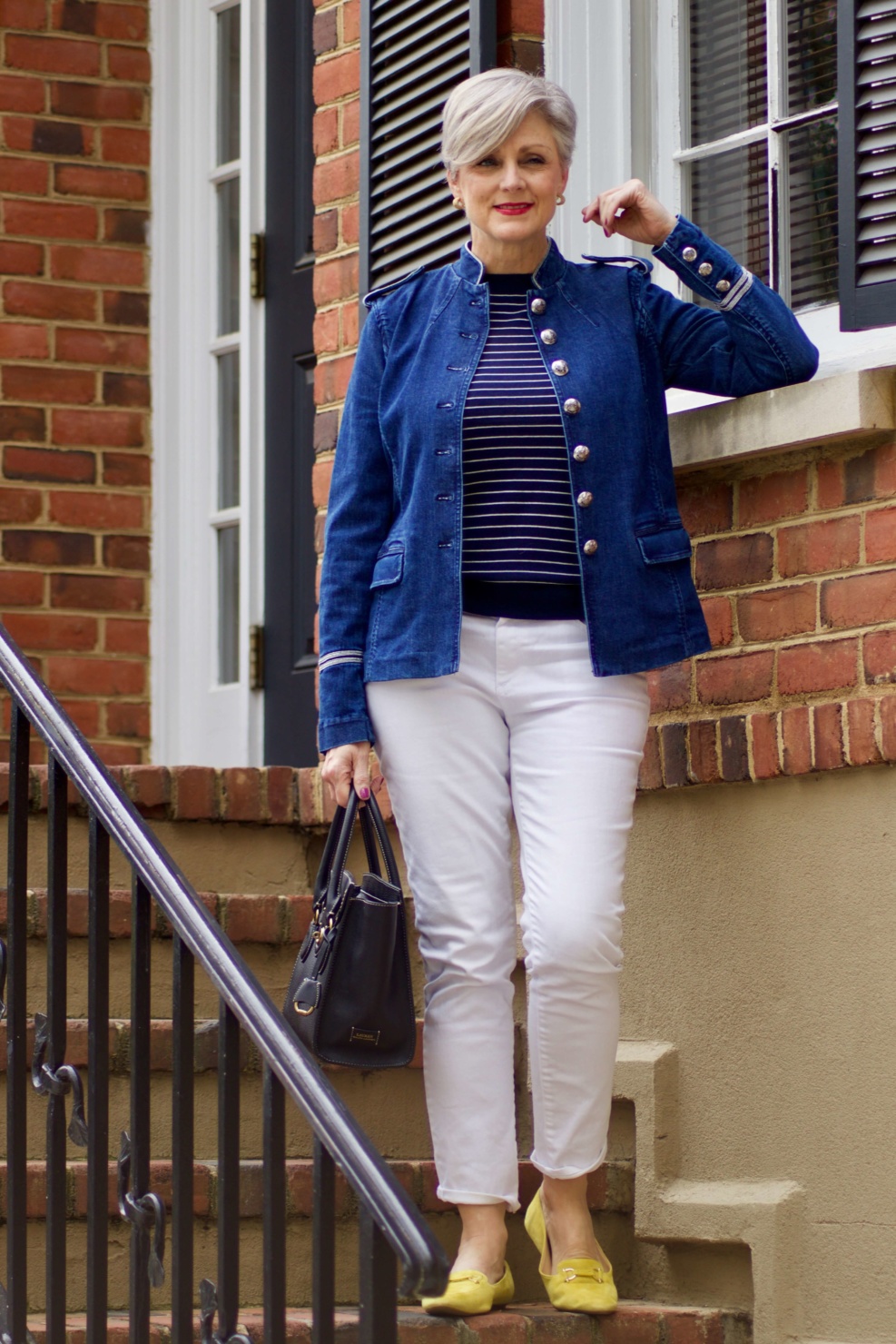 beth from Style at a Certain Age wears a Ralph Lauren denim officers jacket, white denim, striped sweater and yellow driving moccasins